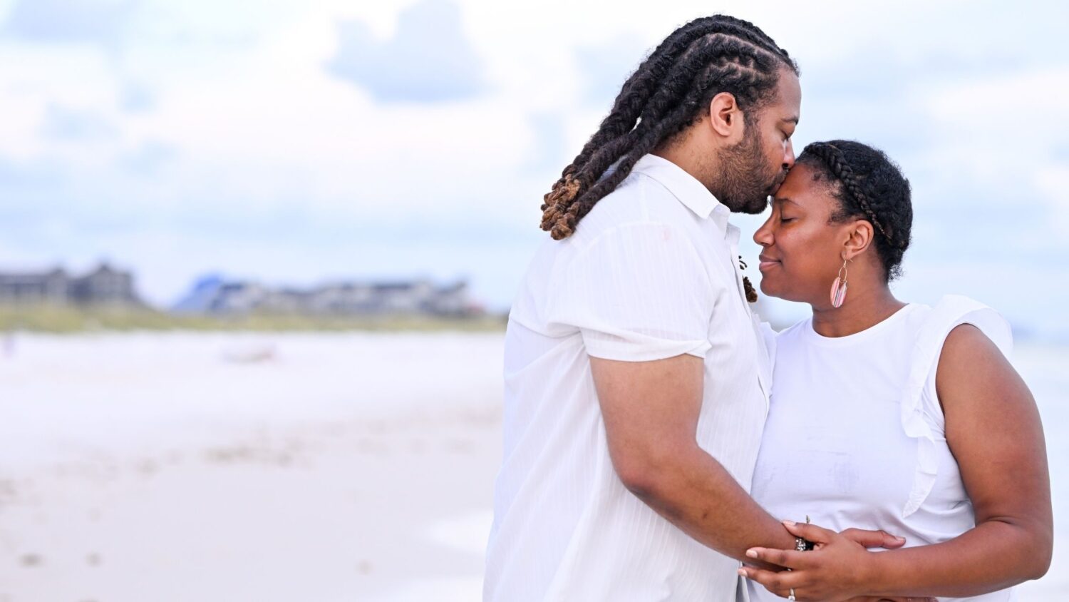 Couple embracing on the beach